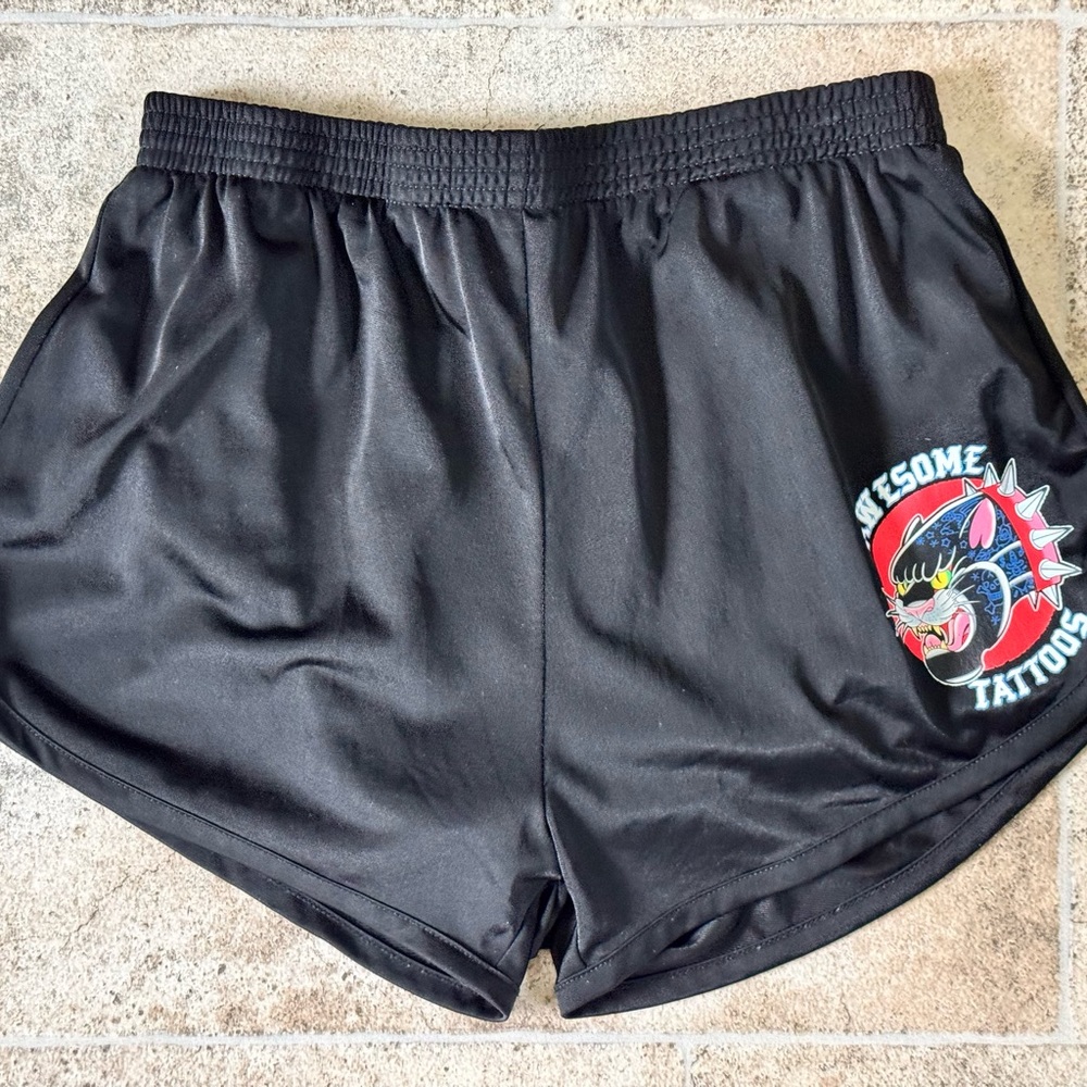 Black “AWESOME TATTOOS” Graphic Panther Shorts. Size small.